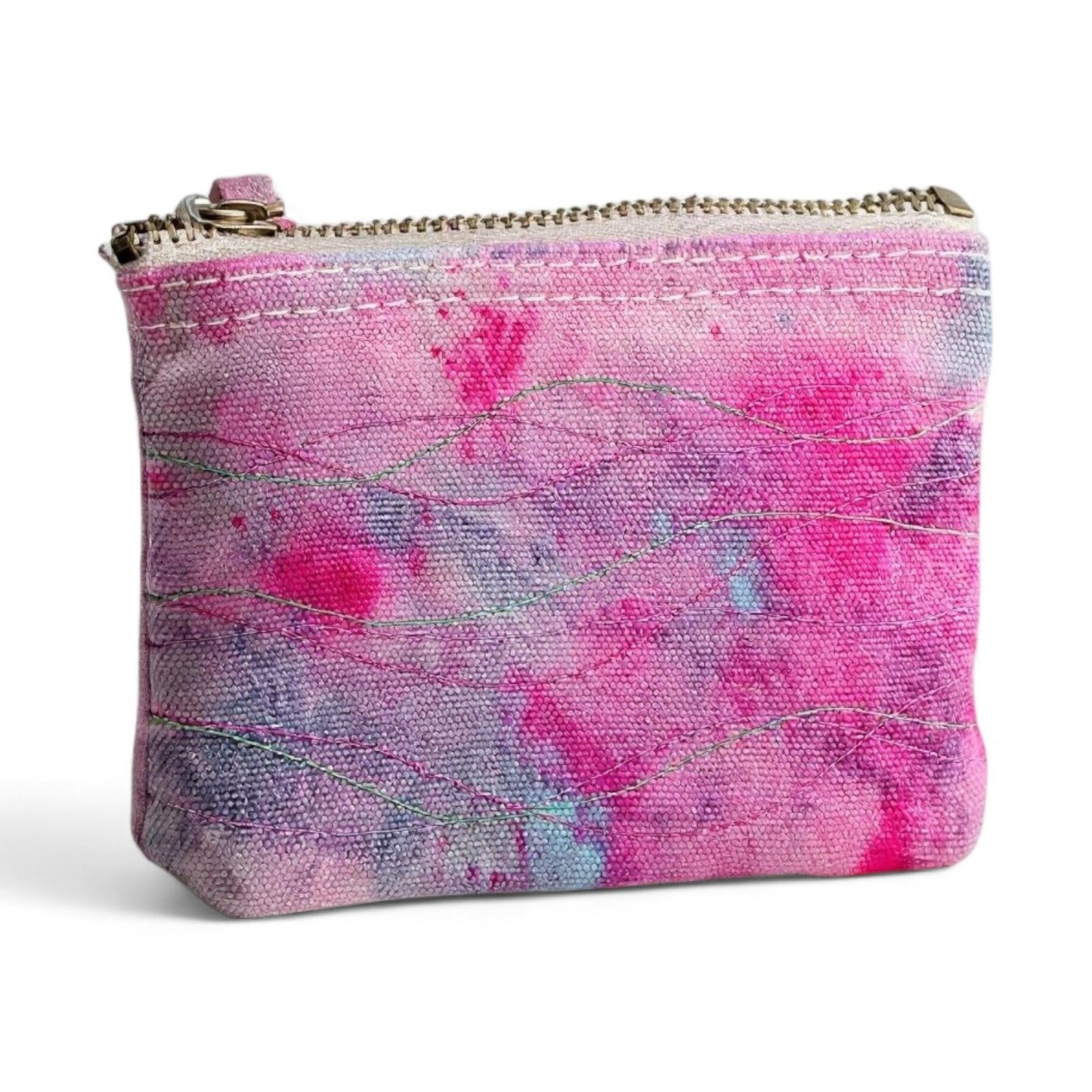 Pink and lilac tie-dyed purse with freehand embroidered waves.
