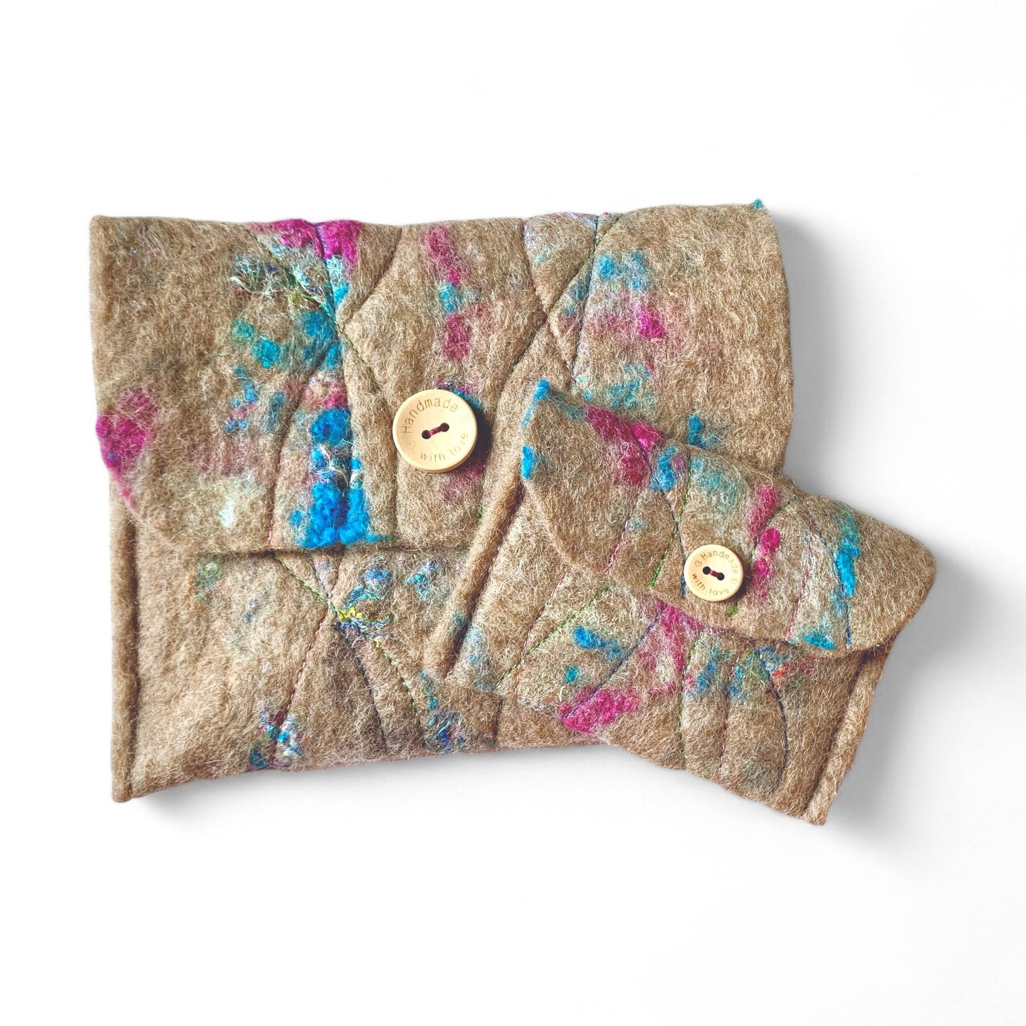 Handmade felt clutch bag and matching change purse with a wild meadow wool design.