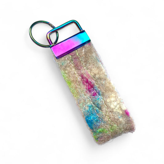 Handmade wild meadow felt keyring with a rainbow metal clasp.