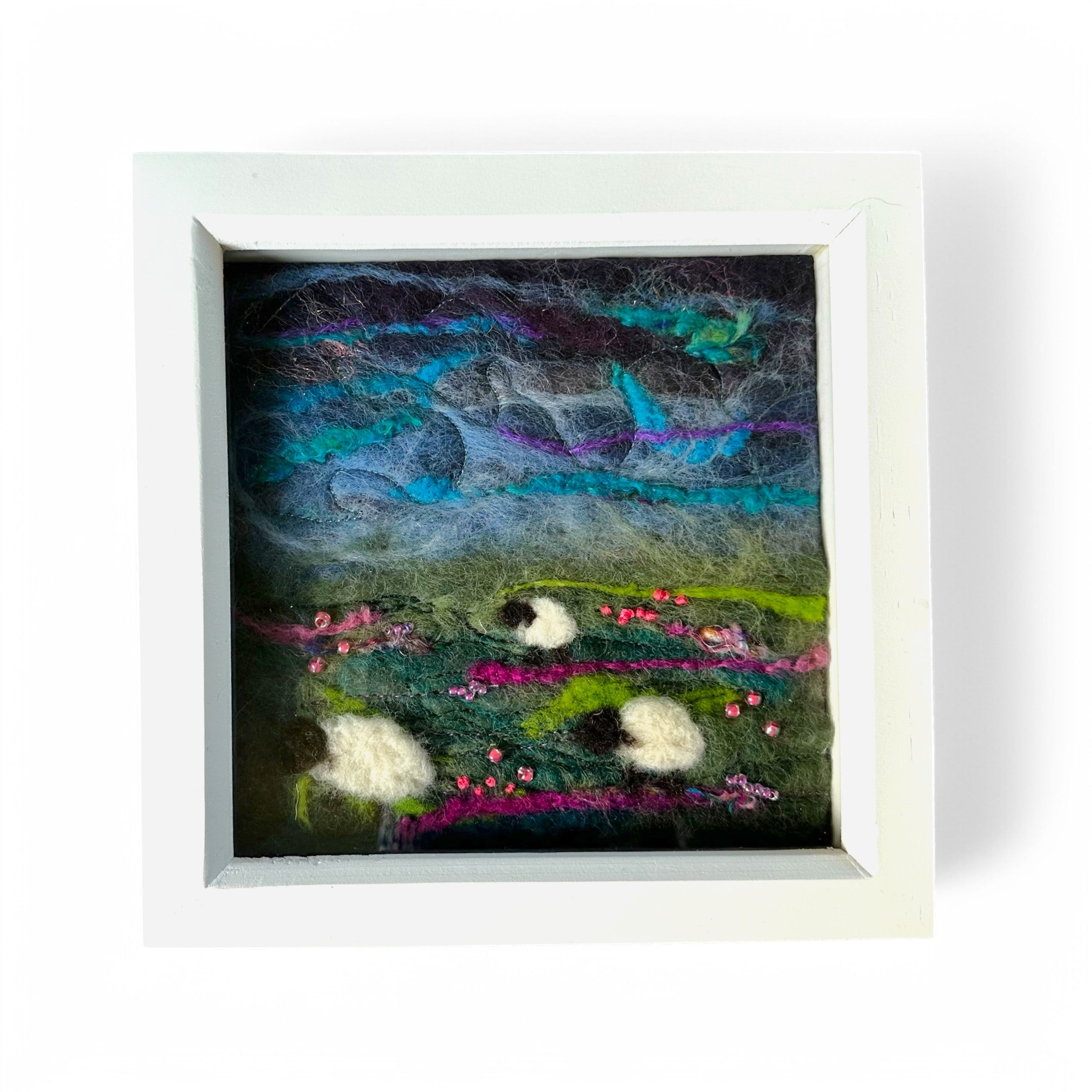 Participant creating a wet felted landscape in Da Craft Shed workshop, Shetland