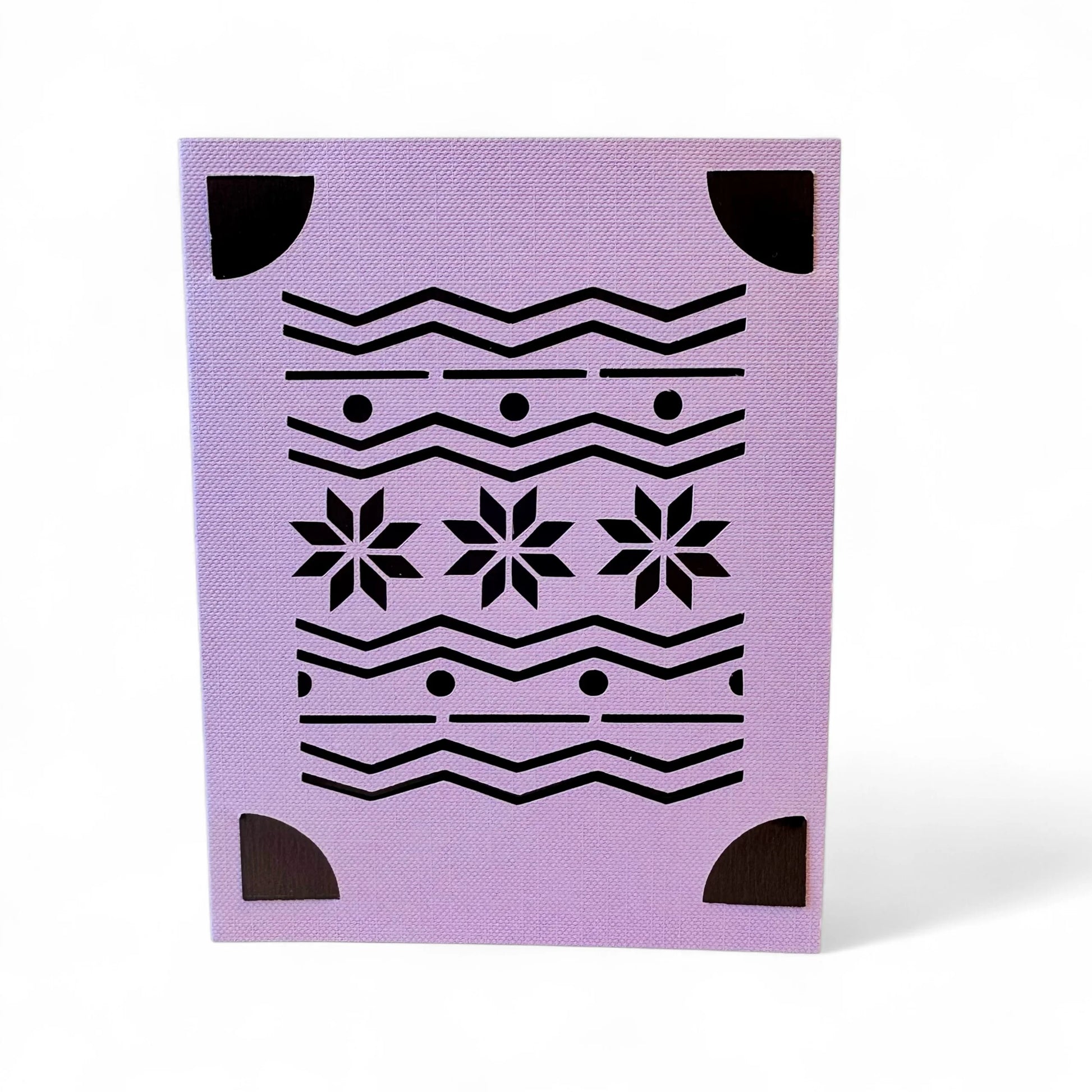 Handmade Fair Isle card in pink with black Fair Isle pattern and brown corner accents.
