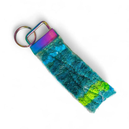 Handmade felt keyring inspired by the Northern Lights in teal and green.