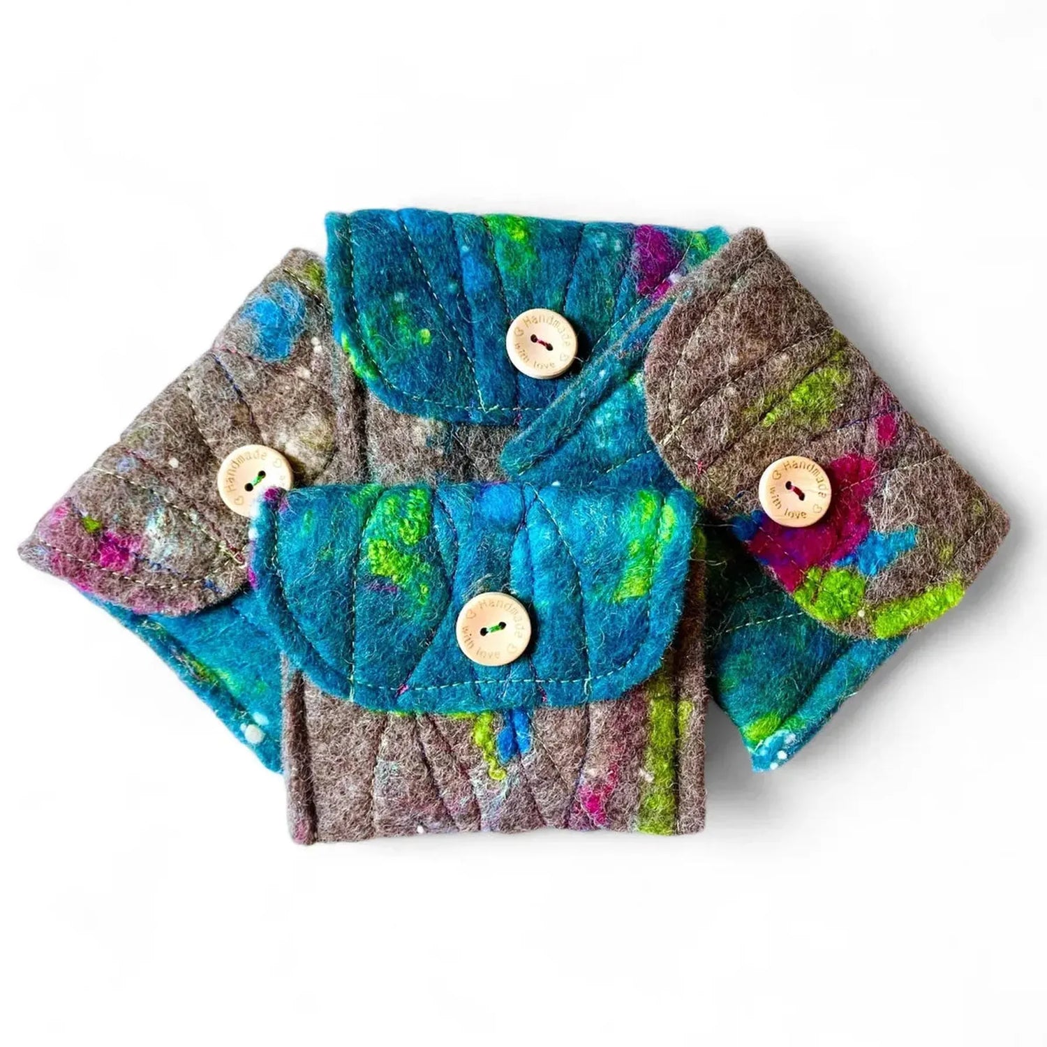 Four handmade felt purses in blue, green, and brown with wooden buttons.