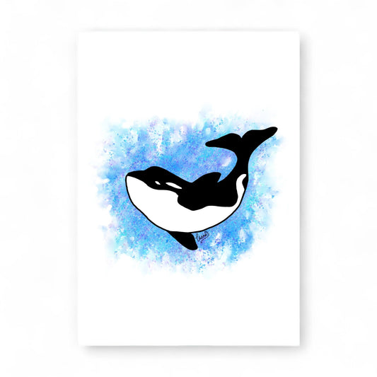 Printed card featuring a black and white orca illustration on a blue watercolor background.