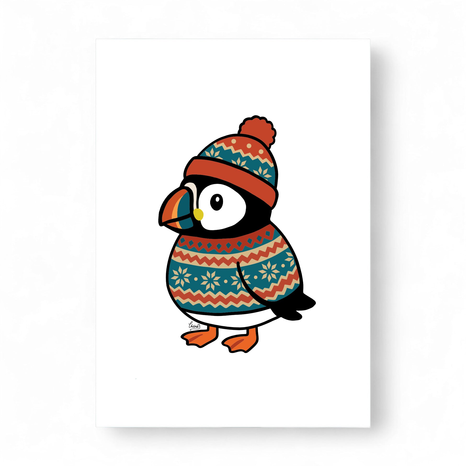 Pete the Puffin wearing a Fair Isle jumper and hat.