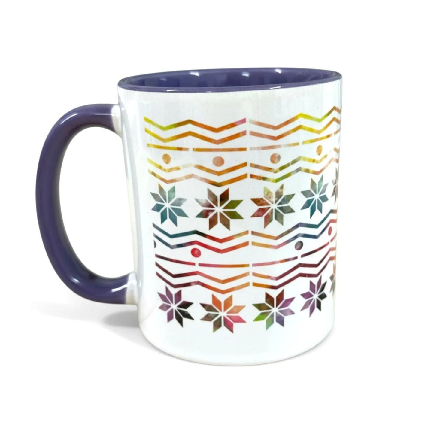 White ceramic mug with a purple handle and interior, featuring a colorful Fair Isle pattern.