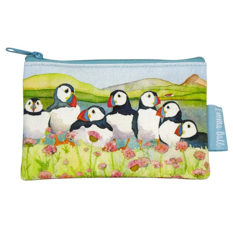 Sea Thrift Puffins Purse featuring a group of puffins in a field of flowers.