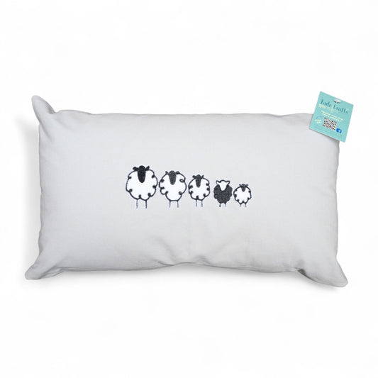 Shetland Sheep Cushion with embroidered sheep design.