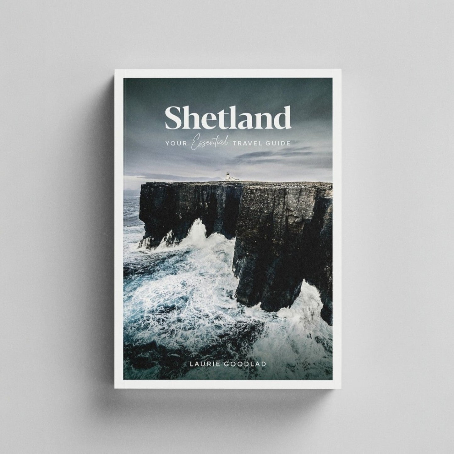 Shetland: Your Essential Travel Guide book cover featuring a dramatic cliffside and ocean view.
