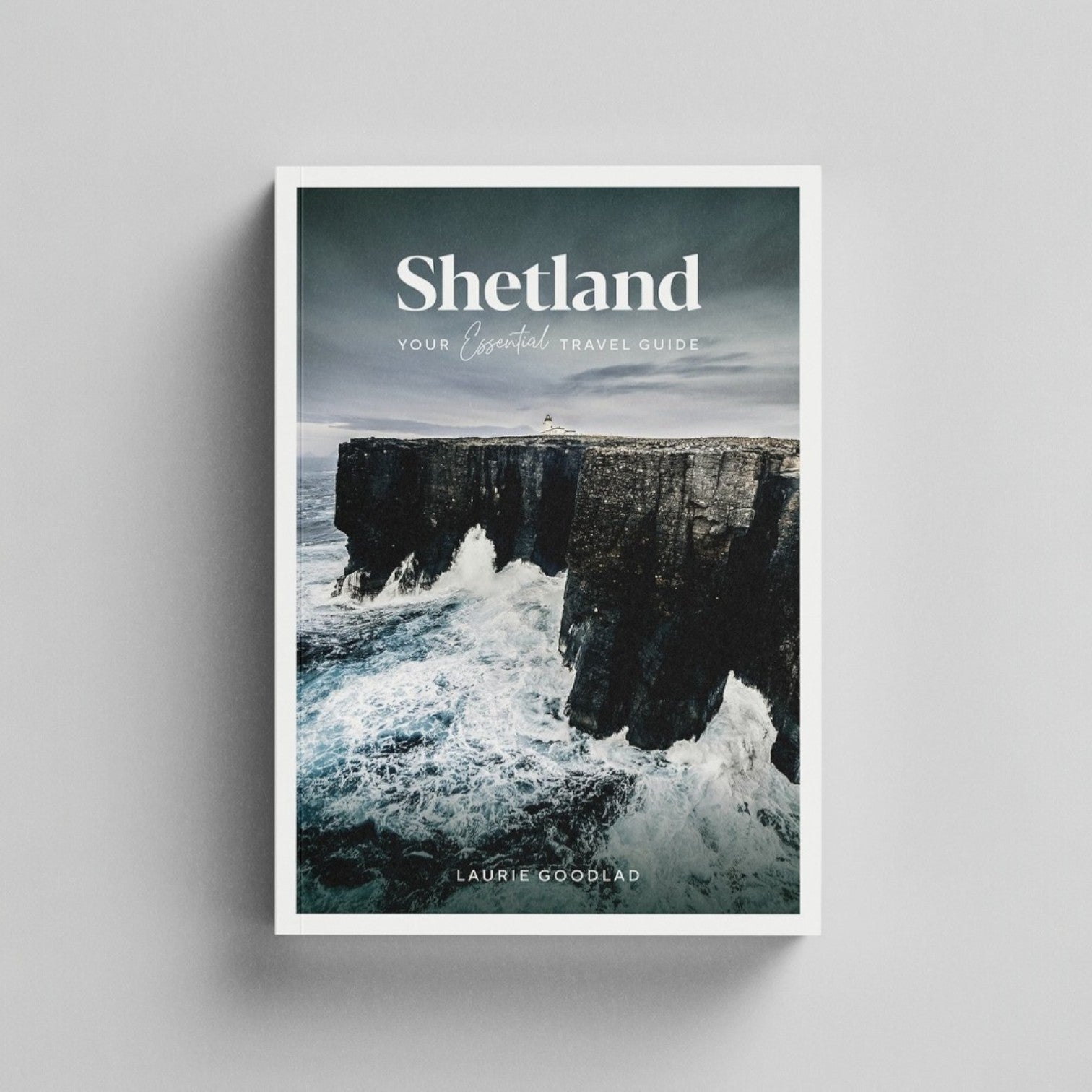 Shetland: Your Essential Travel Guide book cover featuring a dramatic cliffside and ocean view.