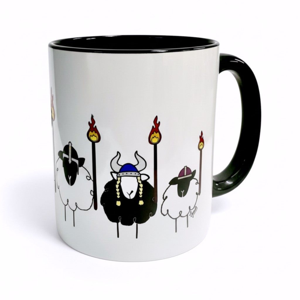 Mug with cartoon Viking sheep and flaming torches.