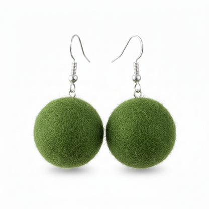 Jade Crafts Shetland hand-felted green wool ball earrings with silver-colored fishhook ear wires.