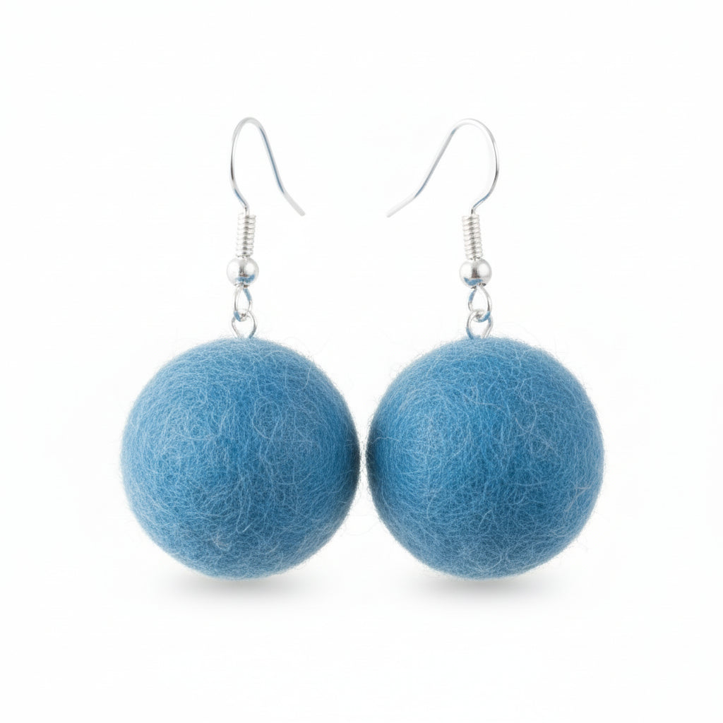 A pair of blue hand-felted wool ball earrings with silver-colored metal hooks.